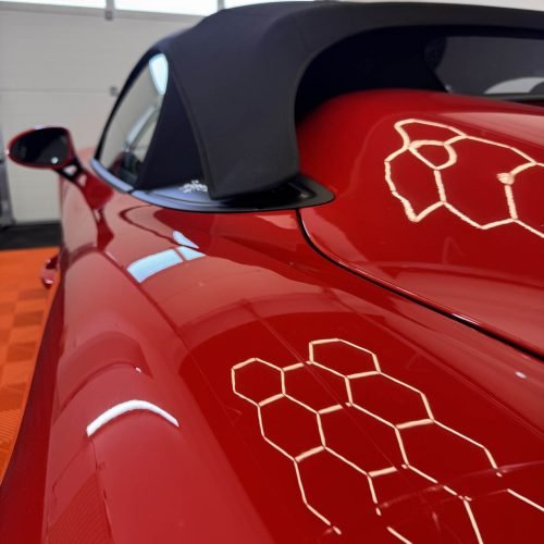 Červené Porsche Spyder - aplikácia ochrannej fólie XPEL Ultimate Fusion
